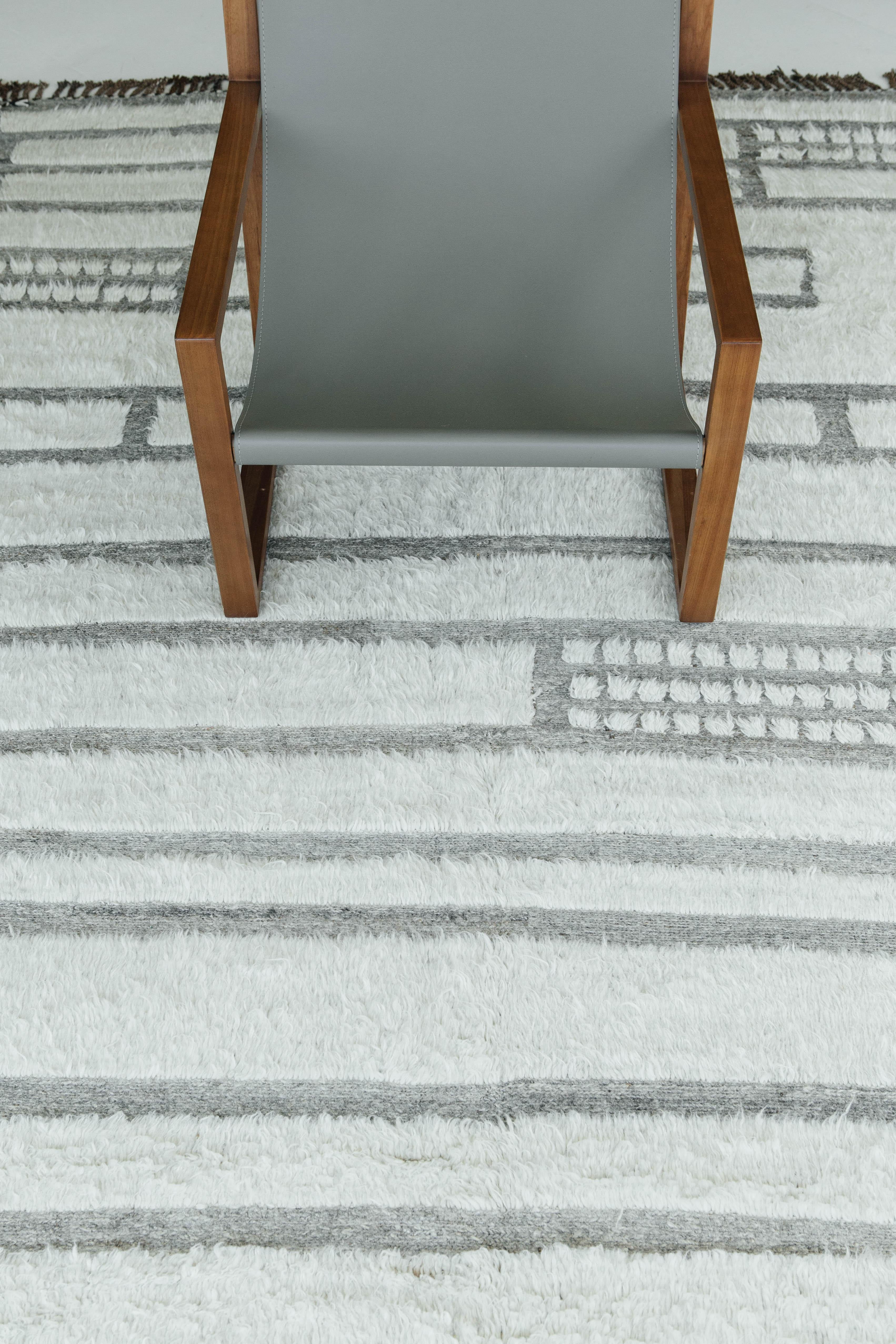 Katabatic is handwoven of a pure white shag on a natural cool grey flat-weave with embossed detailing. Designed in Los Angeles with immense detail, Katabatic bring comfort into your home and is designed to be lived on.



Rug number: