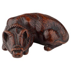 Katabori netsuke in boxwood depicting a recumbent ox