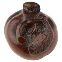 Katabori netsuke in boxwood in the form of a tachibana orange