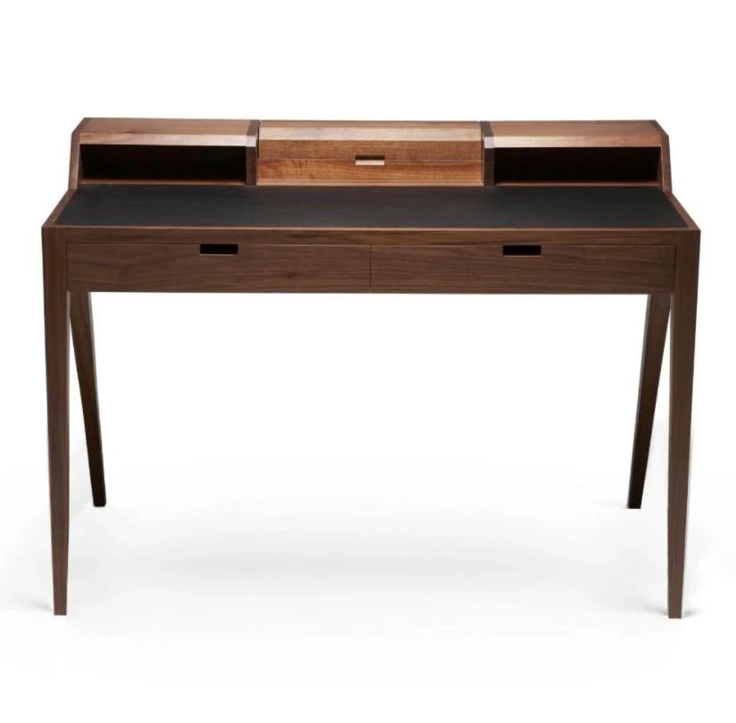 Katakana desk by Dare Studio
Dimensions: W 120 x D 70 x H 85
Materials: American black walnut, black leather

The Katakana desk is a bold and versatile desk designed by Sean Dare for Dare Studio. Inspired by Japanese characters, the distinctive