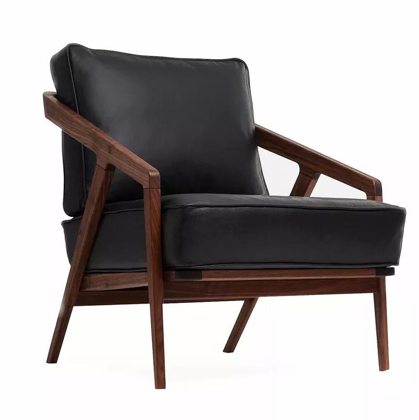 Katakana lounge chair by Dare Studio, 2009
Dimensions: H 79 x D 82.8 x W 72 cm
Materials: American black walnut, black leather
Features: Can be used in vertical or horizontal positions

Also available in European white oak and wax oiled