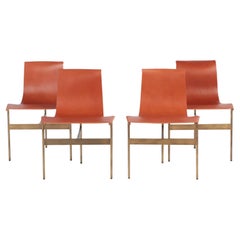 Katavolos Littell and Kelley. Set of four tan leather sling chairs.Contemporary