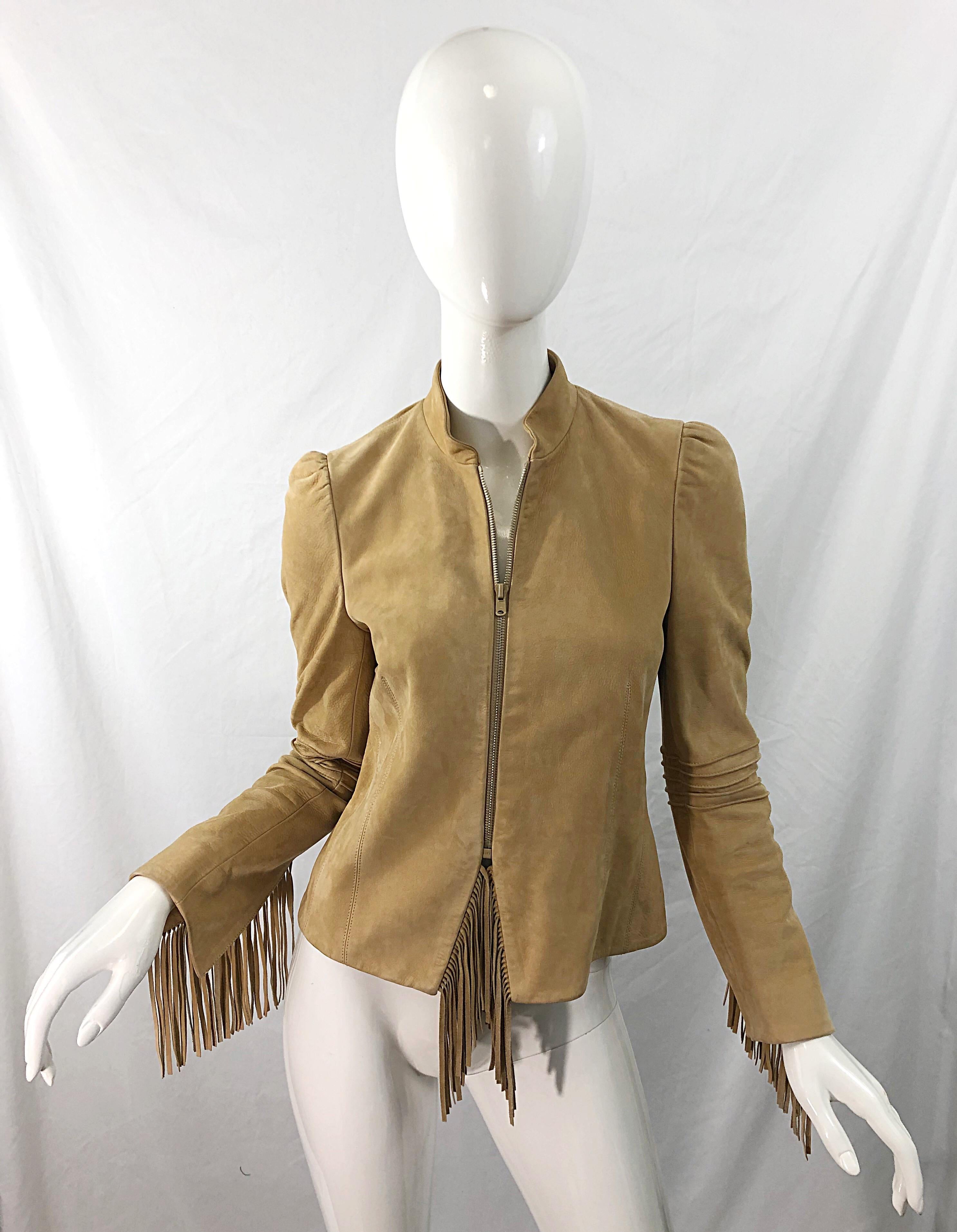 Amazing late 90s vintage KATAYONE ADELI tan nubuck leather fringe moto jacket ! I have been fortunate enough to have had this piece years ago, and it sold in a flash. Smart tailored flattering fit. Full zipper up the front. Fringe under the zipper,