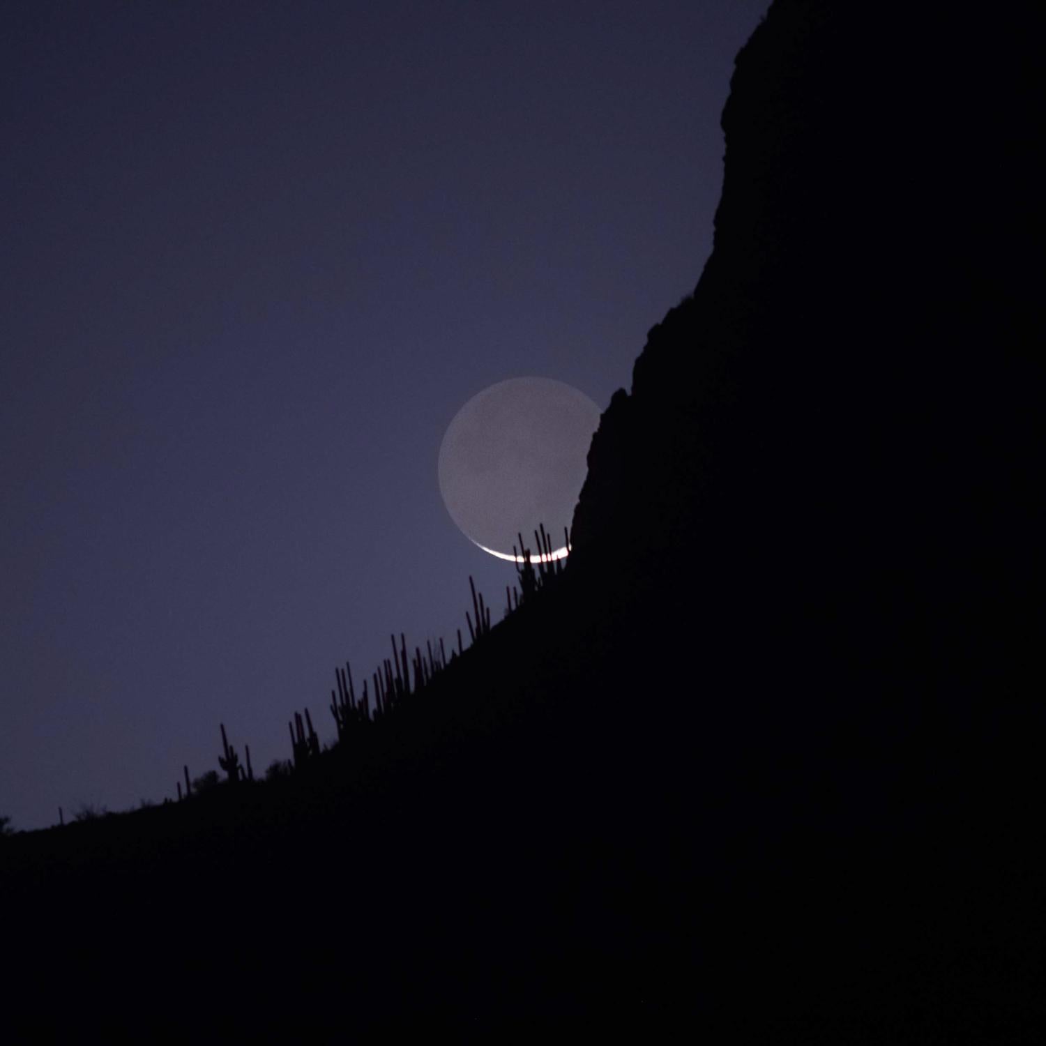Kate Breakey Landscape Photograph - Fingernail Moon Setting Behind Safford Peak