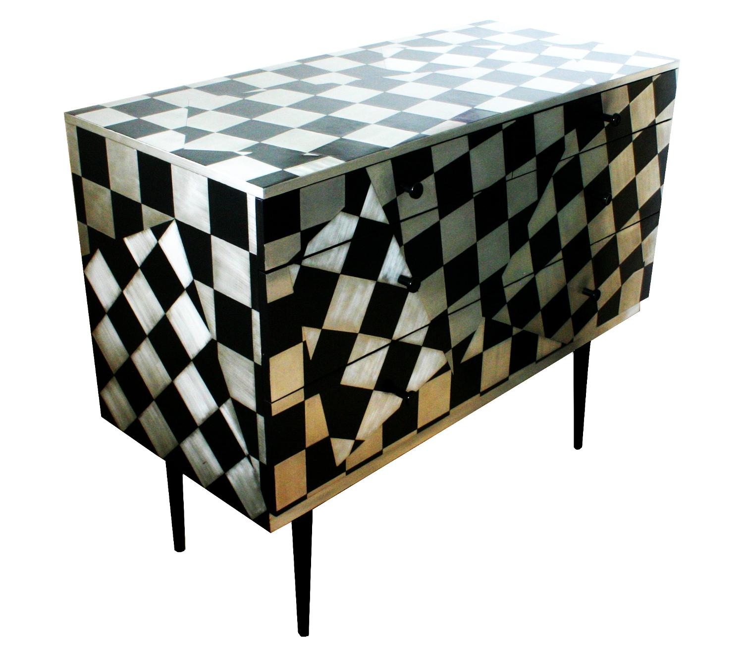 'Checkometry' is a design inspired by a Foale &Tuffin suit at the V&A.

A mid to late Twentieth Century chest of drawers that has been reconditioned and reimagined by designer and maker Kate Noakes. Kate uses a unique process that she has developed