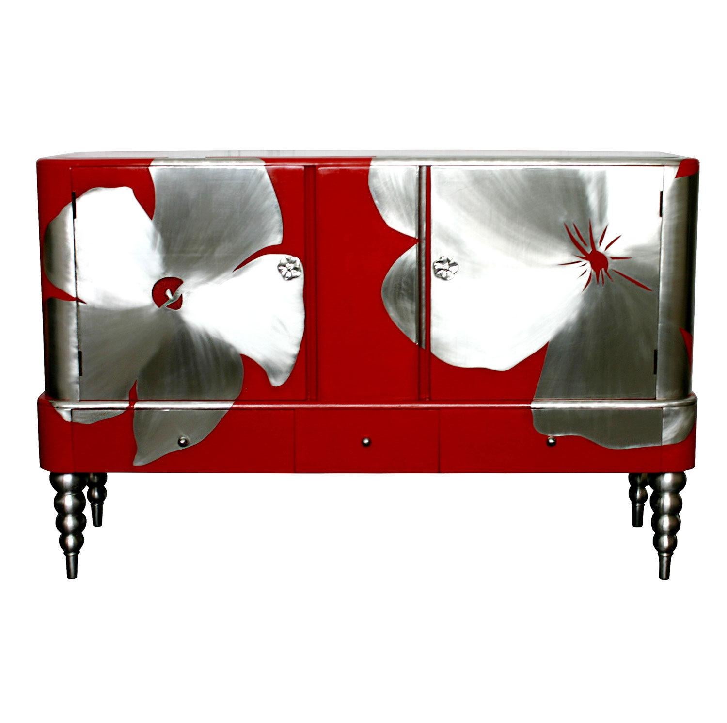 A mid-century sideboard that has been reconditioned and reimagined by designer and maker Kate Noakes using a unique process that Kate has developed of drawing and cutting her original designs in sheet metal, that are applied onto existing furniture