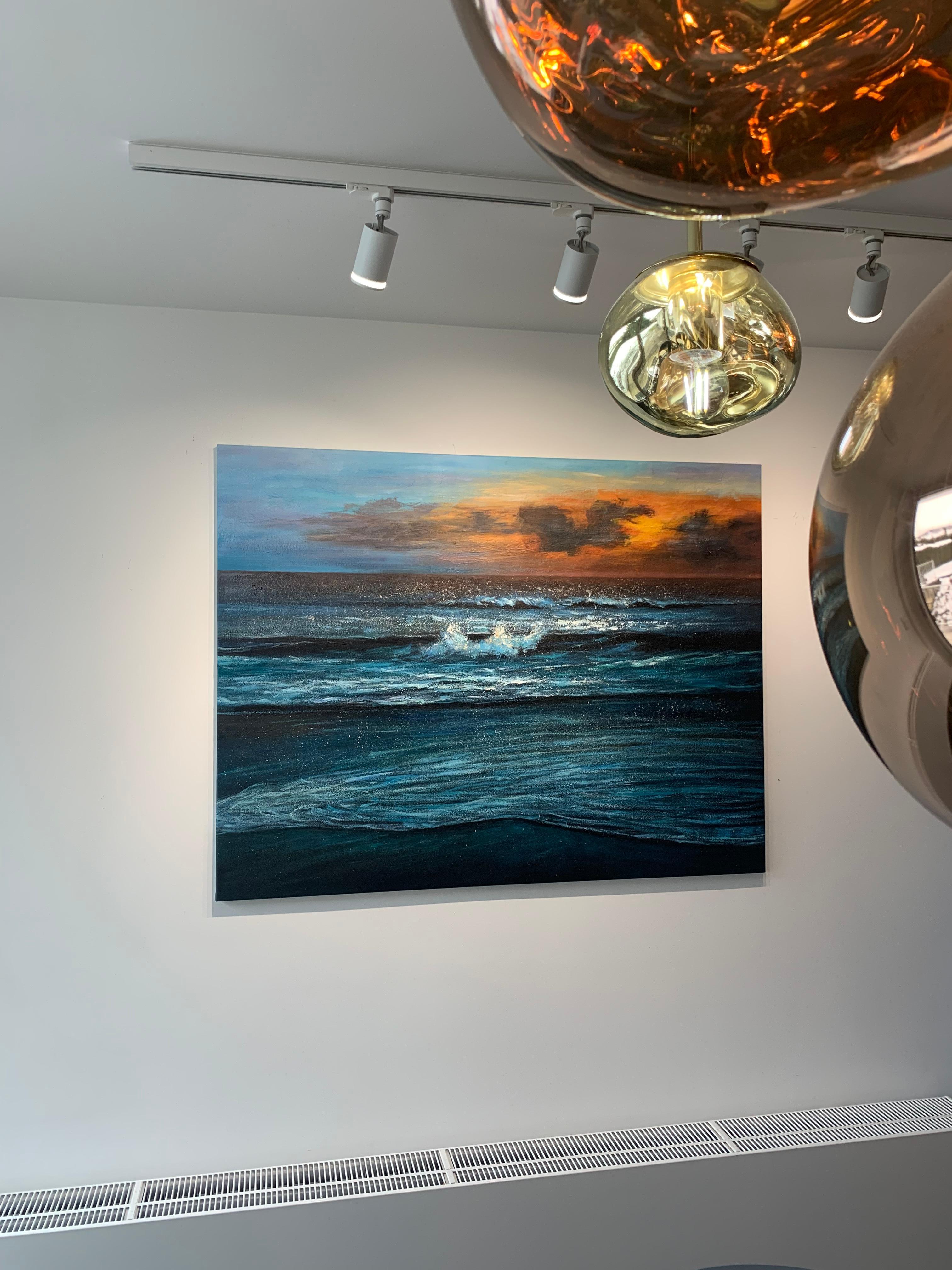 Beautiful sunset waves crashing peacefully at dusk. This contemporary landscape painting is full of vibrant blue colors and a warm sun, creating an atmospheric artwork. Reminding us of days spent on the beach.
Oil painting on canvas.