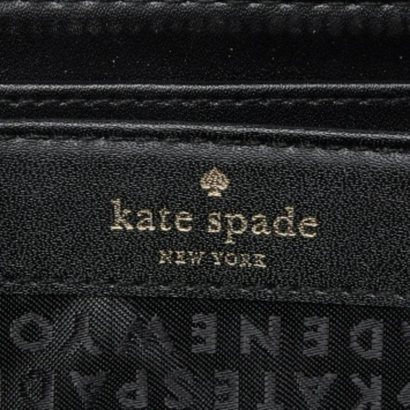 Kate Spade Blaue Portemonnaie mit Reißverschluss und FLoral-Druck aus Leder (Schwarz) im Angebot