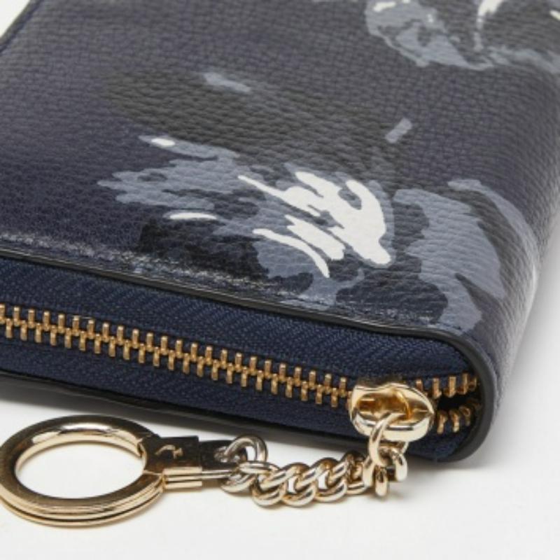 Kate Spade Blaue Portemonnaie mit Reißverschluss und FLoral-Druck aus Leder Damen im Angebot