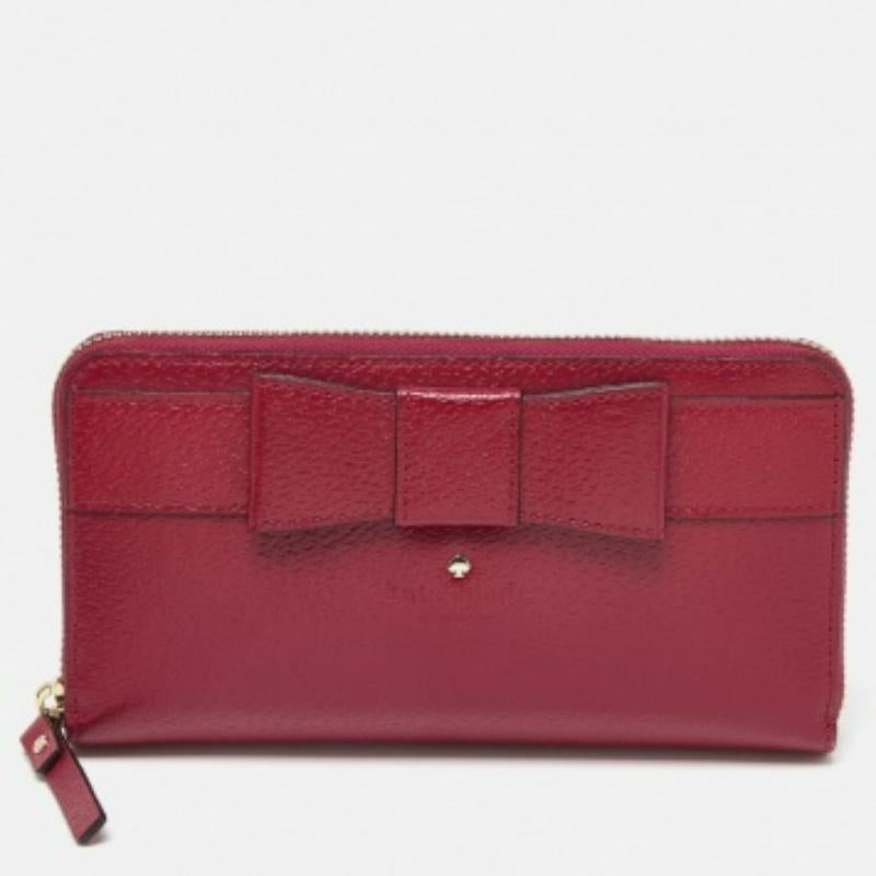 Kate Spade - Portefeuille zippé en cuir avec nœud en Bourgogne en vente 3