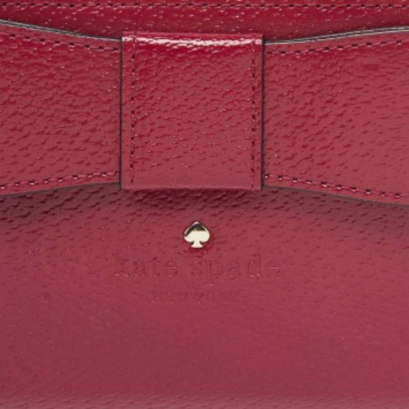 Kate Spade - Portefeuille zippé en cuir avec nœud en Bourgogne en vente 4