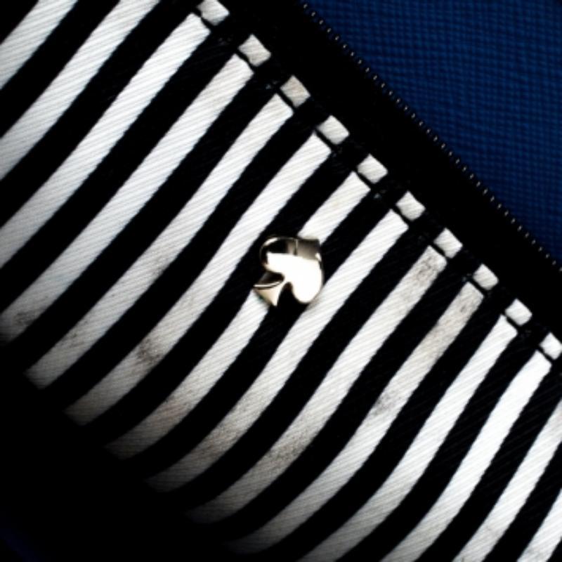 This Kate Spade satchel is simply inimitable in its plush and modern design. It is crafted from leather and features a flap on the exterior. It flaunts dual top handles, a shoulder strap, and a nylon-lined interior capable of holding all your daily