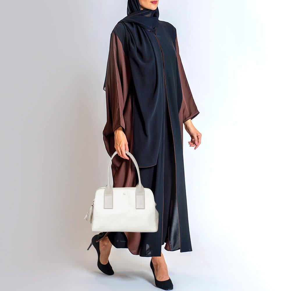 This satchel is rendered in the finest quality materials into an elegant design. Versatile and functional it is well sized for your daily use.