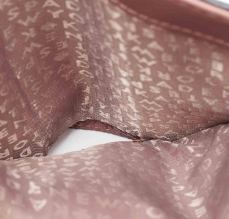 Portefeuille compact trifold en cuir rose de Kate Spade en vente 4