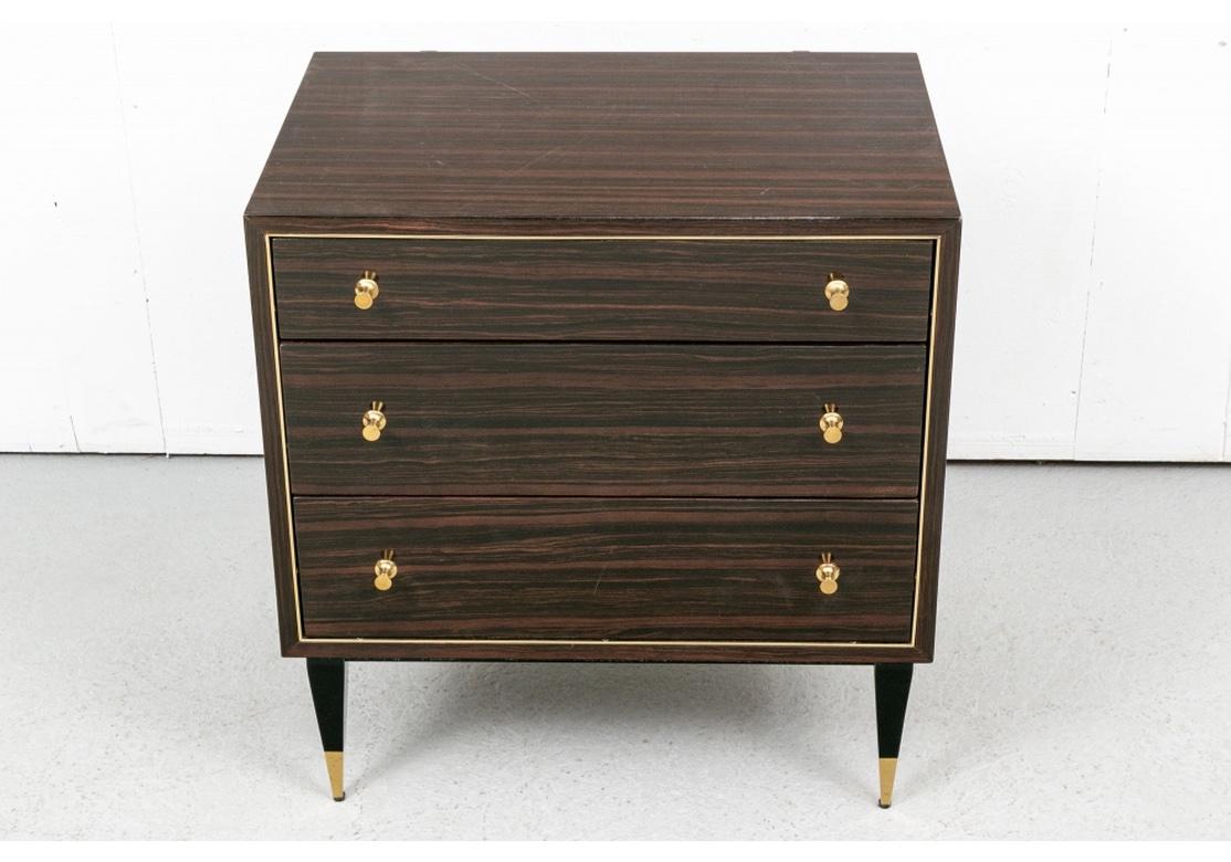 Made by E.J. Victor for Kate Spade. Clean lines and very well made with tapered brass tipped legs and brass pulls reminiscent of the iconic hardware of the iconic Paul McCobb designs. 
Minor hairline scratches and some minor age and use marks