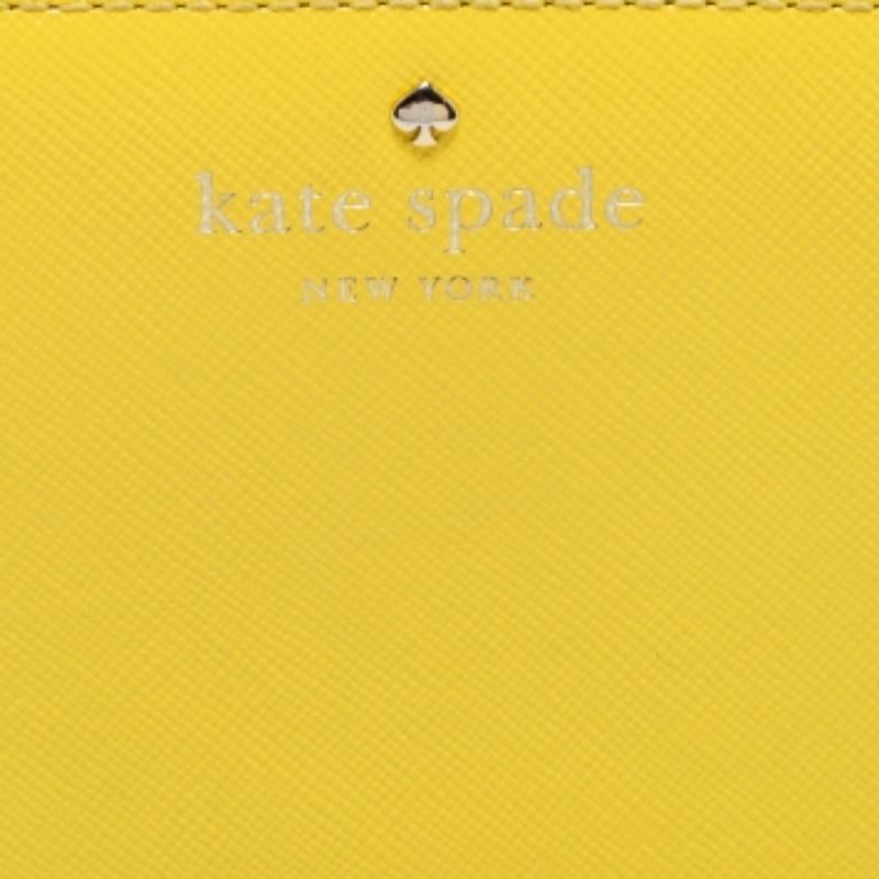 Cartera con cremallera de piel amarilla Kate Spade en venta 5