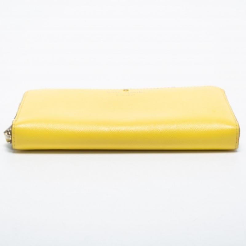 Cartera con cremallera de piel amarilla Kate Spade Amarillo en venta
