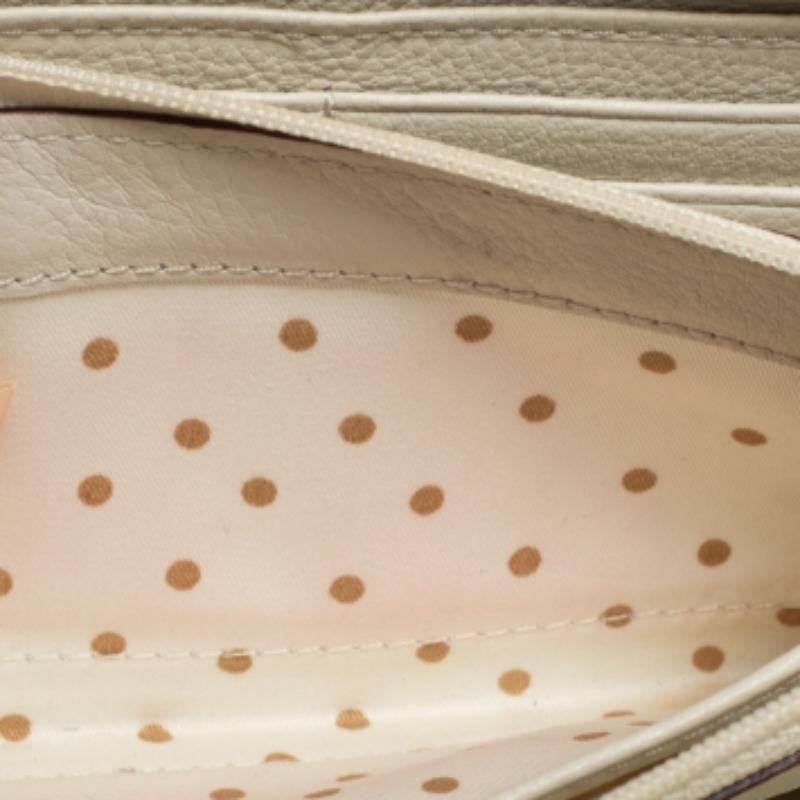 Cartera con cremallera de piel amarilla Kate Spade en venta 2