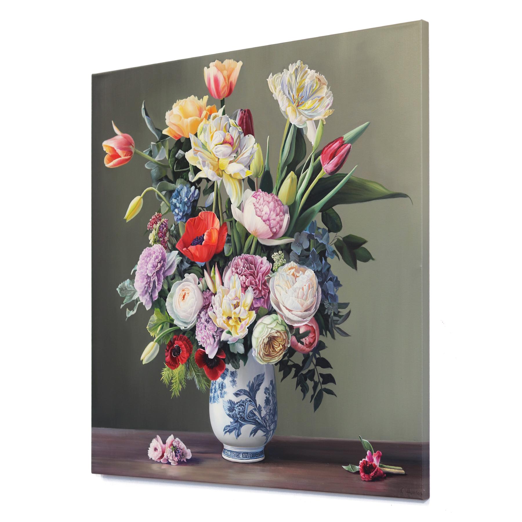 Inspired by paintings created by old masters and the immersive nature she experienced in the Black Forest, German artist Katharina Husslein paints in a representational hyperrealistic manner to capture lively bouquets and saturated landscapes.