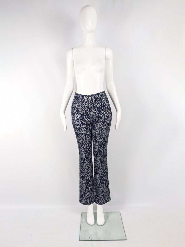 A stunning pair of vintage women's jeans from the 90s by iconic British fashion designer, Katharine Hamnett, who has gained a cult following for her edgy clubwear and often political designs, most notably her 'Choose Life' t-shirts worn by many