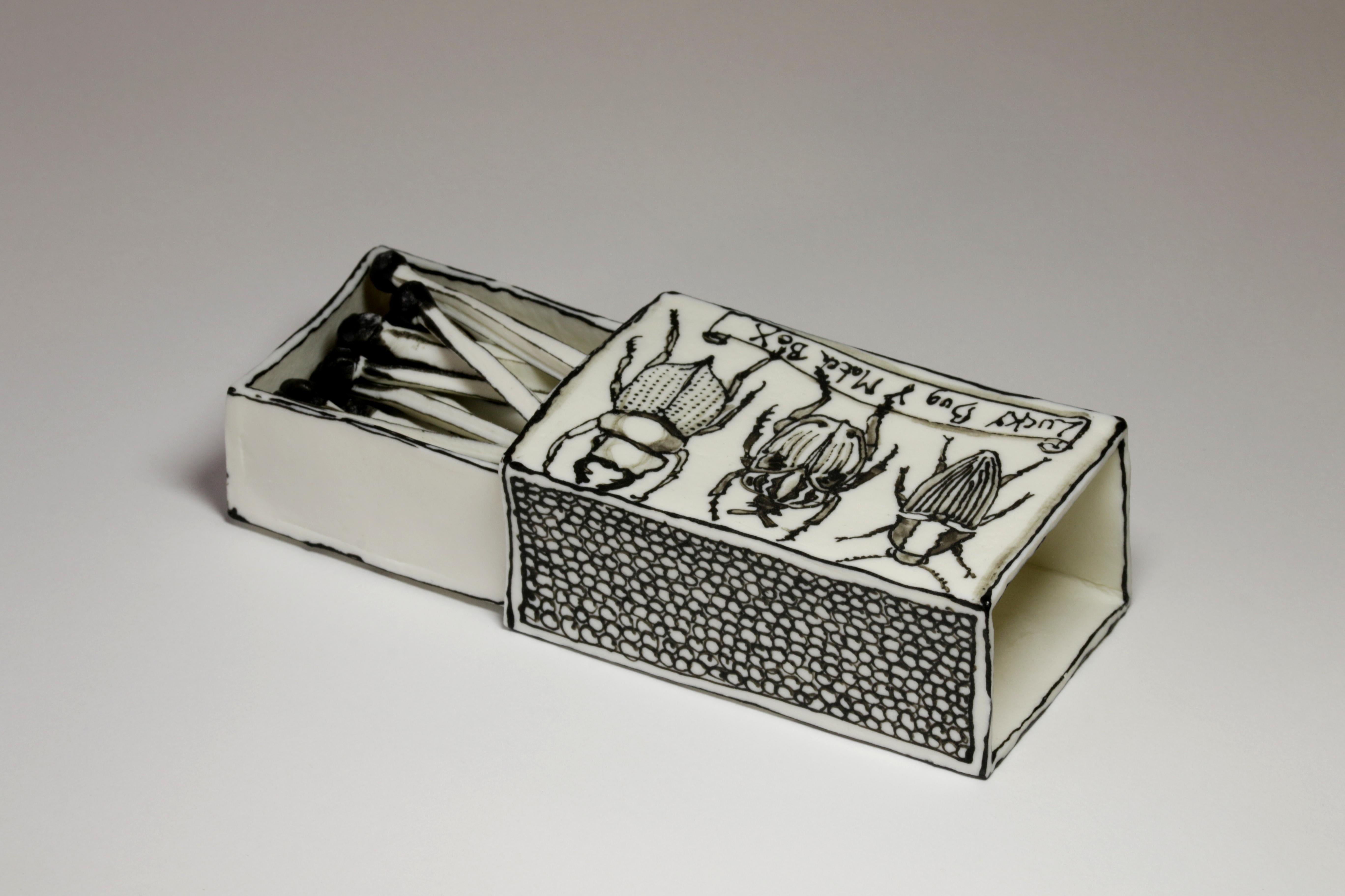 Bug Matchbox: Black & white porcelain ceramic pop surreal drawing sculpture - Sculpture by Katharine Morling