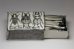 Bug Matchbox: Black & white porcelain ceramic pop surreal drawing sculpture