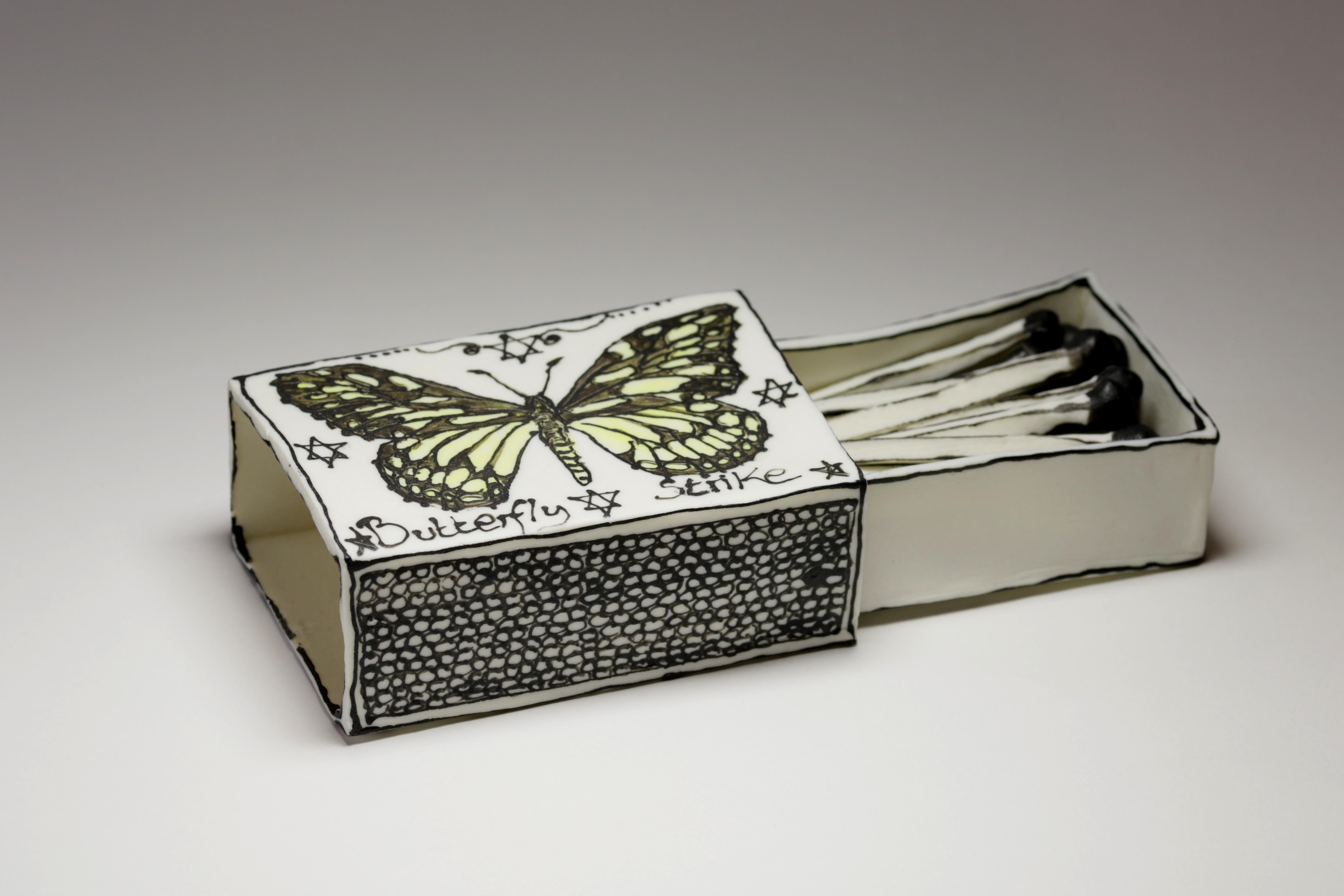 Butterfly Matchbox: Black & white porcelain ceramic pop surreal sculpture - Sculpture by Katharine Morling