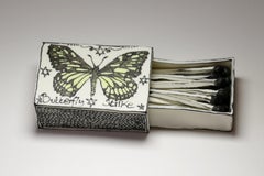 Butterfly Matchbox: Black & white porcelain ceramic pop surreal sculpture