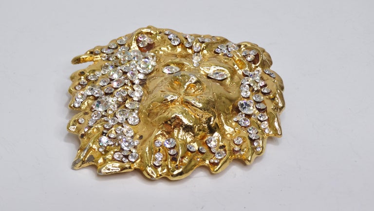 Add some GLAM to your belt buckle collection! Catch someone's attention from across the room with the sparkle. This intricate lion belt buckle is designed and signed by Kathrine Baumann in 1993 and completely adorned in varying sized of Swarovski