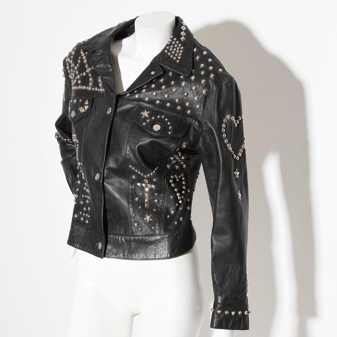 From the notable designer’s fall winter 1990 collection the studded “clean up or die” leather jacket reflects her political activism in addition to her androgynous aesthetic of dress for both sexes. This exact jacket is part of an all leather