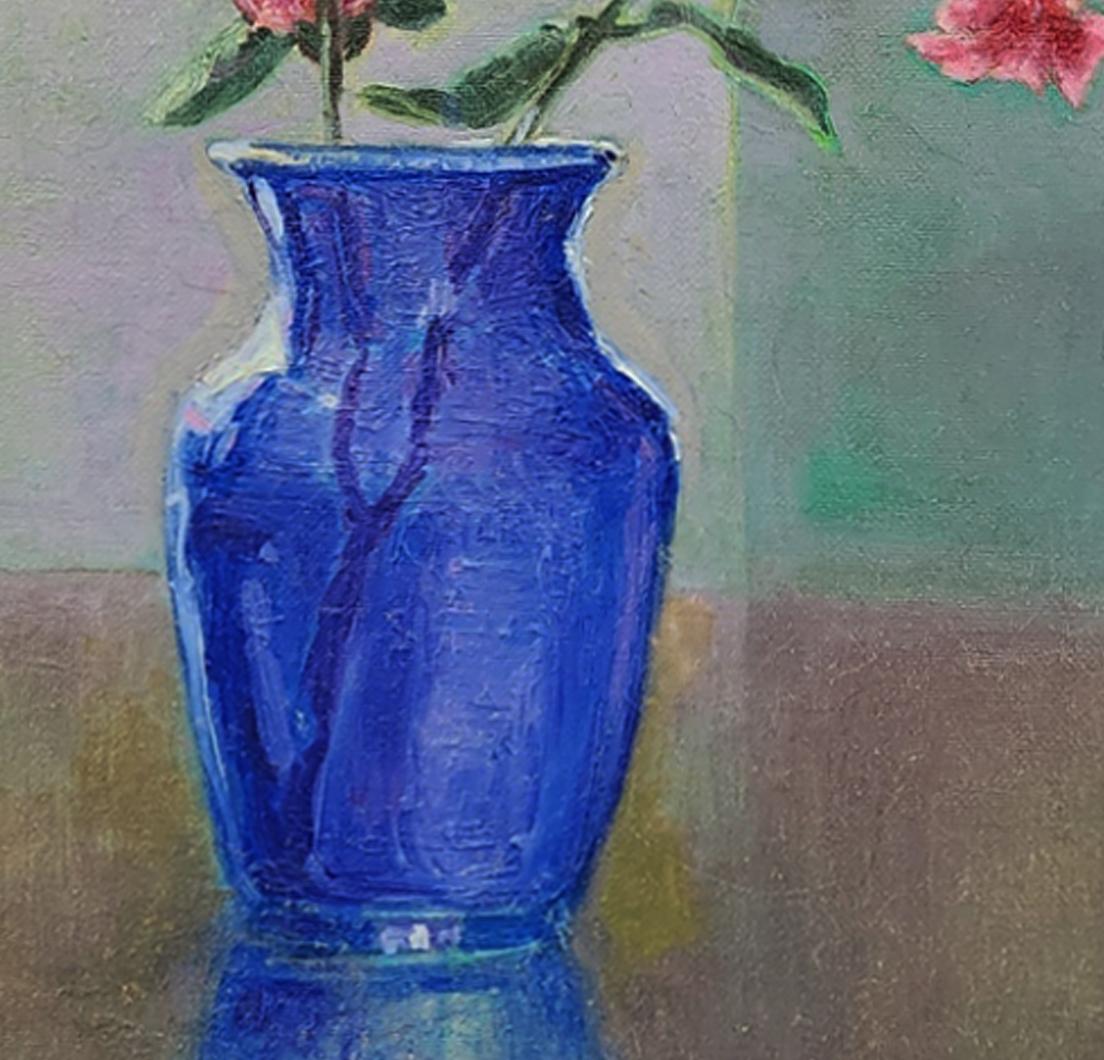 Still life painting of a simple spray of bright pink bougainvillea that contrasts the deep cobalt blues of the vase. The vivid pinks of the bracts are expressed in hues of Scarlet Lake, Quinacridone Magenta, and Deep Crimson. This square floral