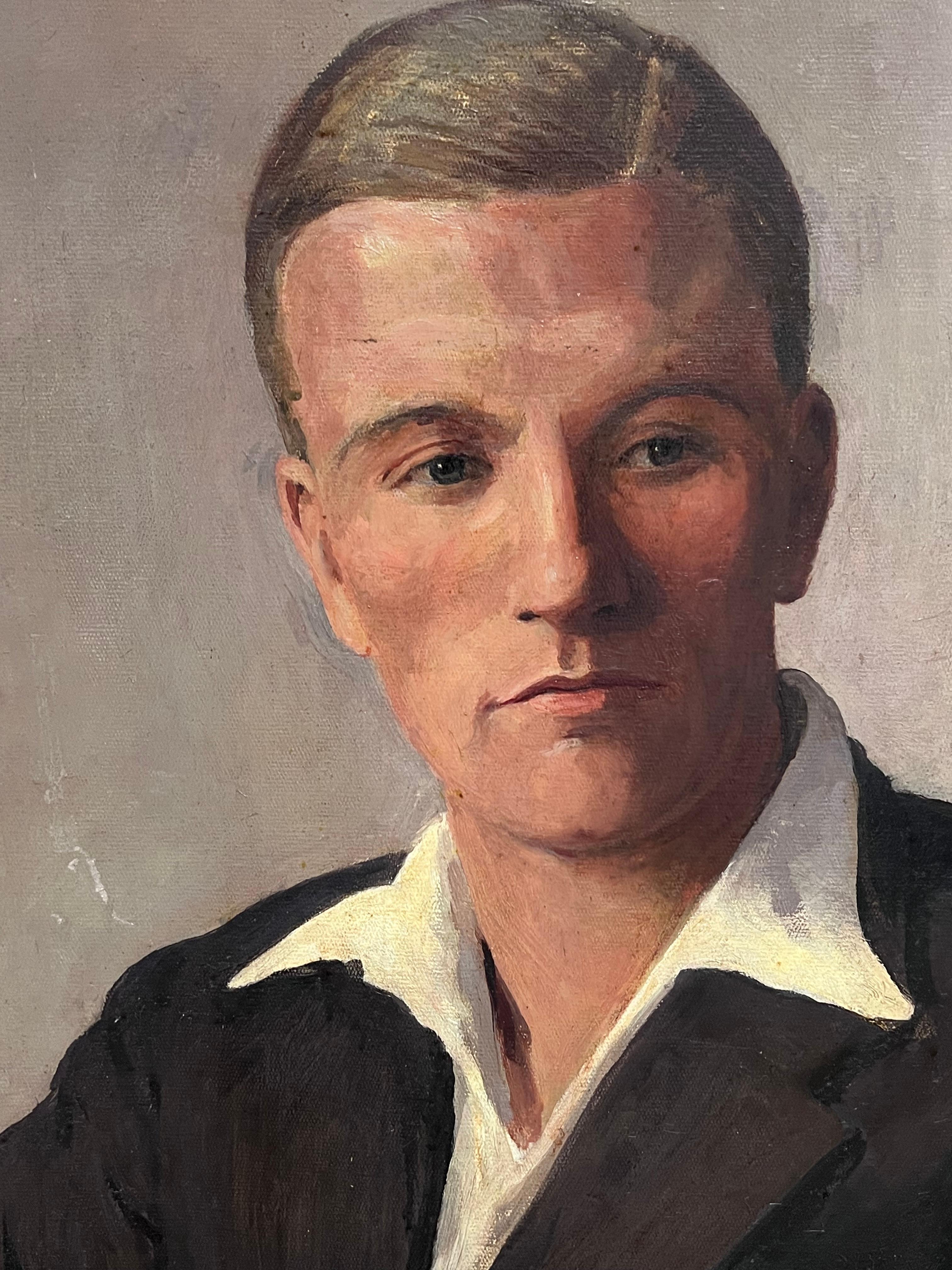 Ritratto del 1930 di un giovane gentiluomo inglese in giacca e cravatta di un club sportivo universitario 2