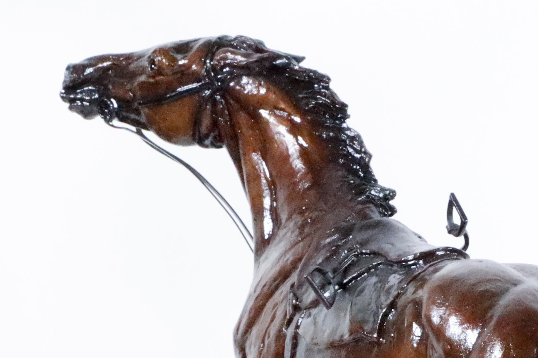 Troublemaker, Bolting Horse without Rider  - Gold Figurative Sculpture by Kathleen Friedenberg