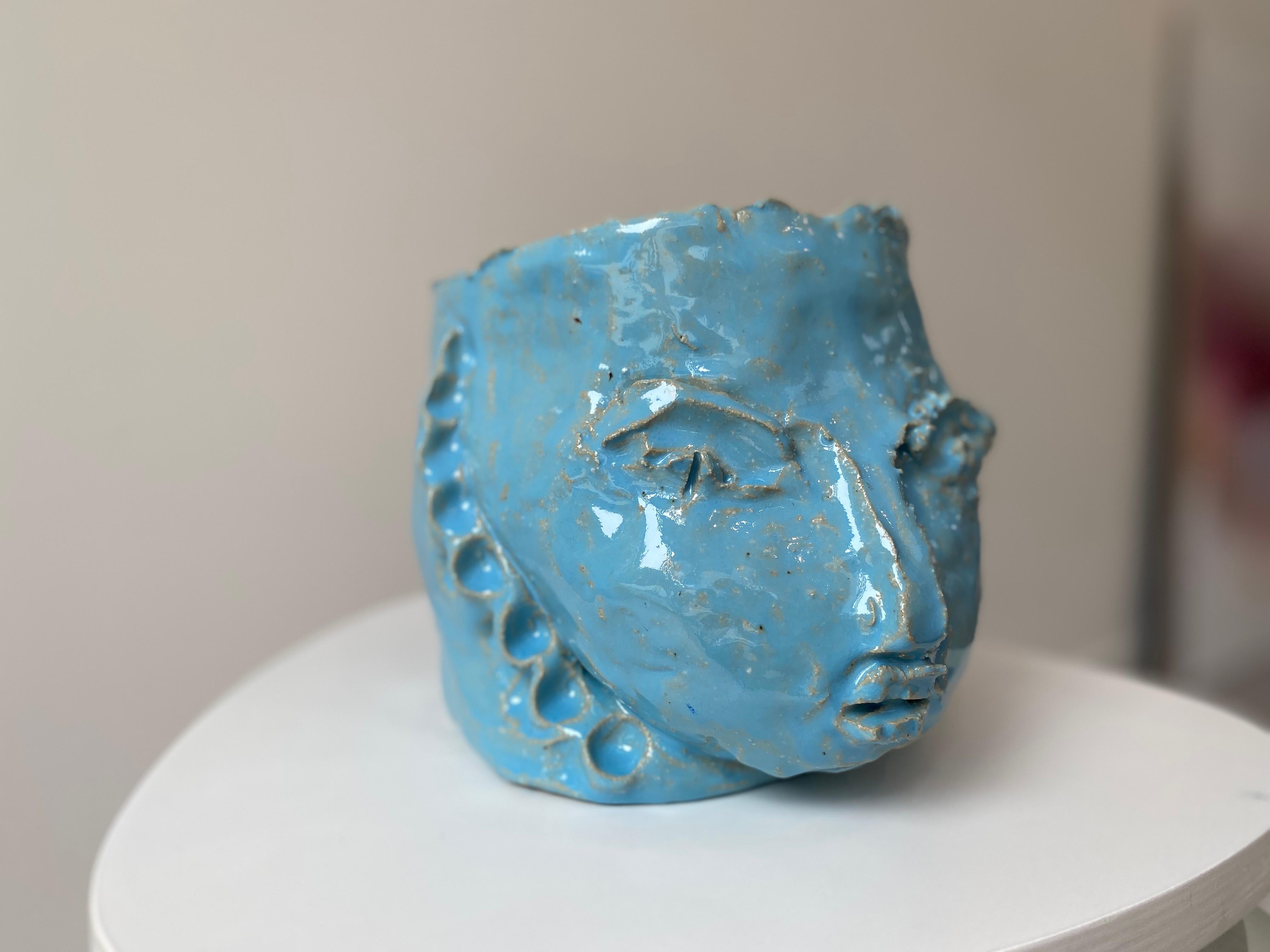 'Baby Blue' wabi sabi beauty in imperfection, appreciate simplicity, handmade unique sculpture.

Elevate your space with this extraordinary exquisitely sculpted clay face and head vase creation that promises to captivate and inspire. Transform your