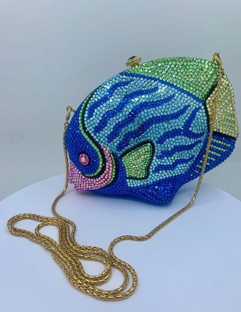 Exquisite, handmade by designer, Kathrine Baumann, who is the celebrated handbag maker to the stars, vivid tropical fish shaped minaudière, evening bag or evening clutch is completely covered in finest quality sparkling Swarovski crystals. Gold