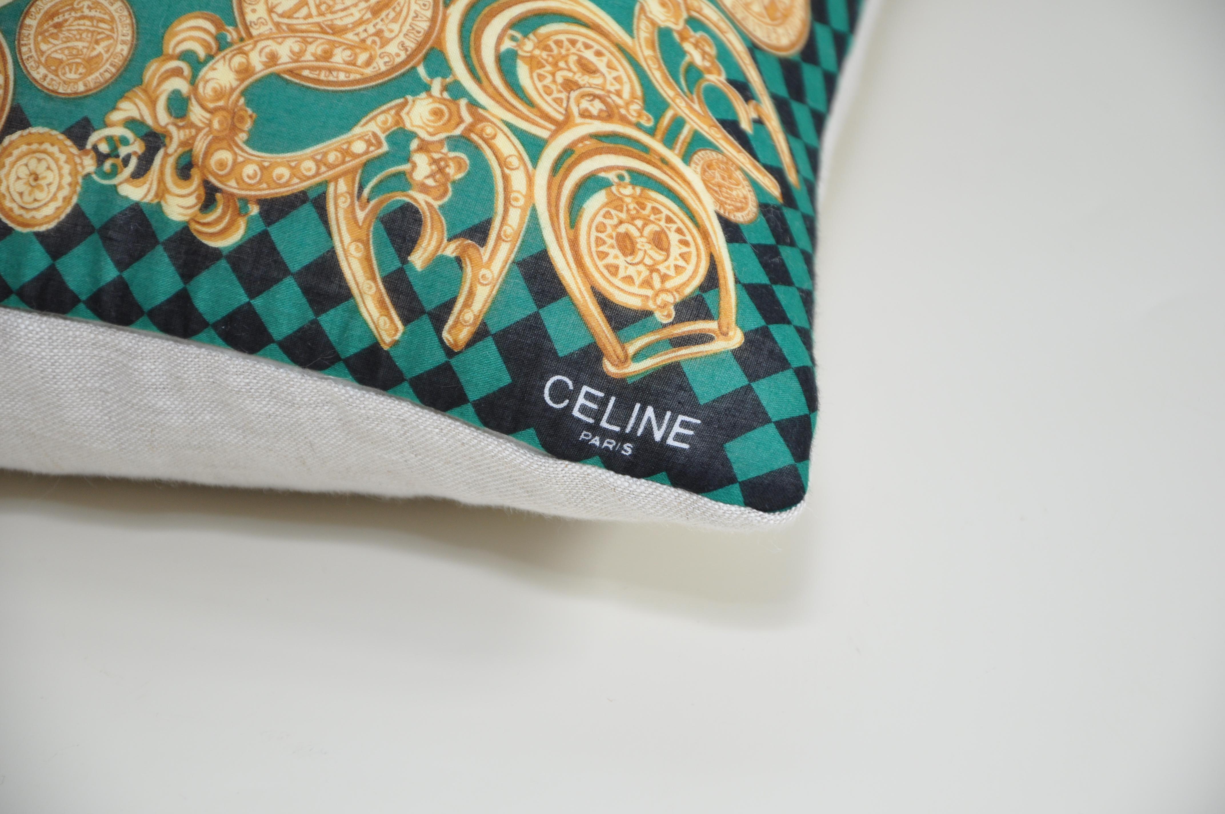 Title:
Katie Larmour vintage Celine scarf backed in pure Irish Linen cushion pillow green gold

Description:
This gem is a one-of-a-kind custom made luxury cushion (pillow) from an exquisite vintage Celine fashion scarf in a very unique and