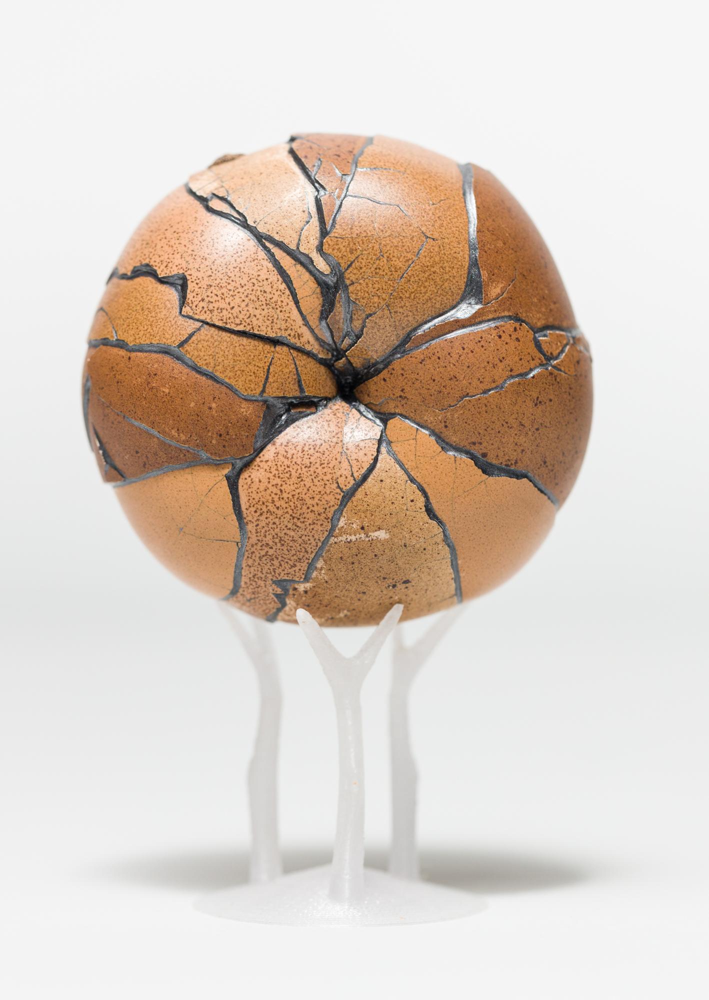 Katie VanVliet Still-Life Sculpture - "Donut (Chocolate)", Found Object Sculpture, Egg Motif