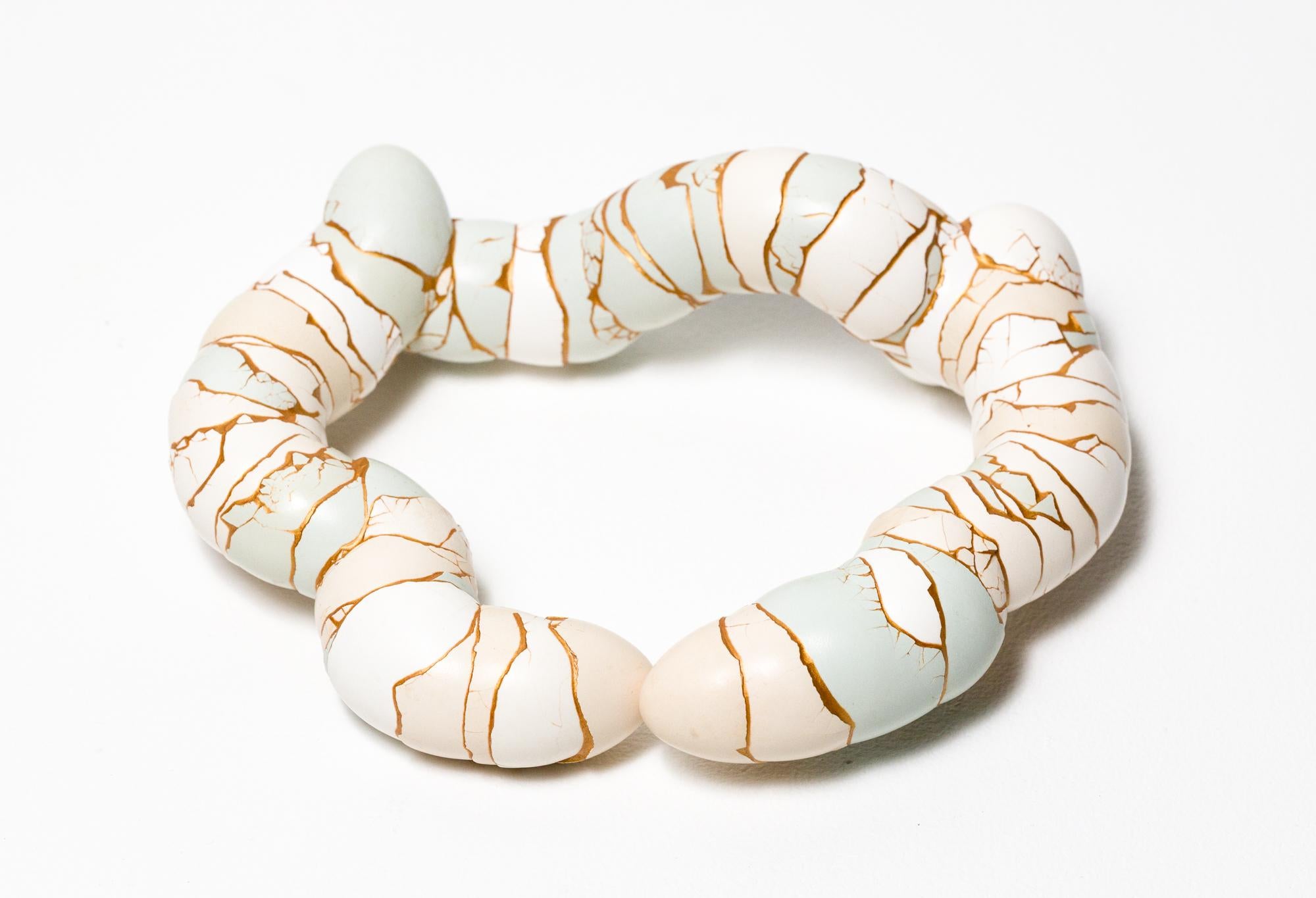 "Peck", reconstructed egg assembly - Sculpture by Katie VanVliet