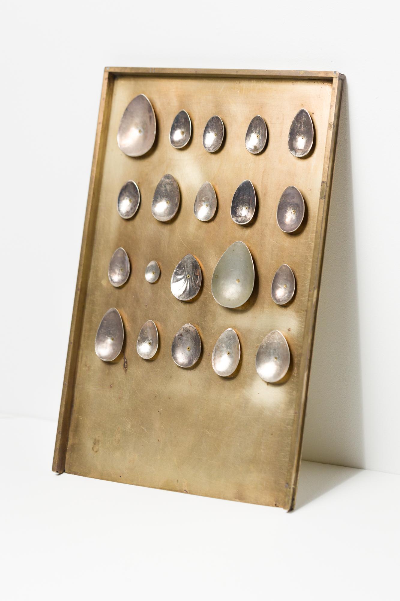 Katie VanVliet Still-Life Sculpture - "Twenty Silver Eggs", Found Object Assemblage, Egg Motif, Brass, Silver