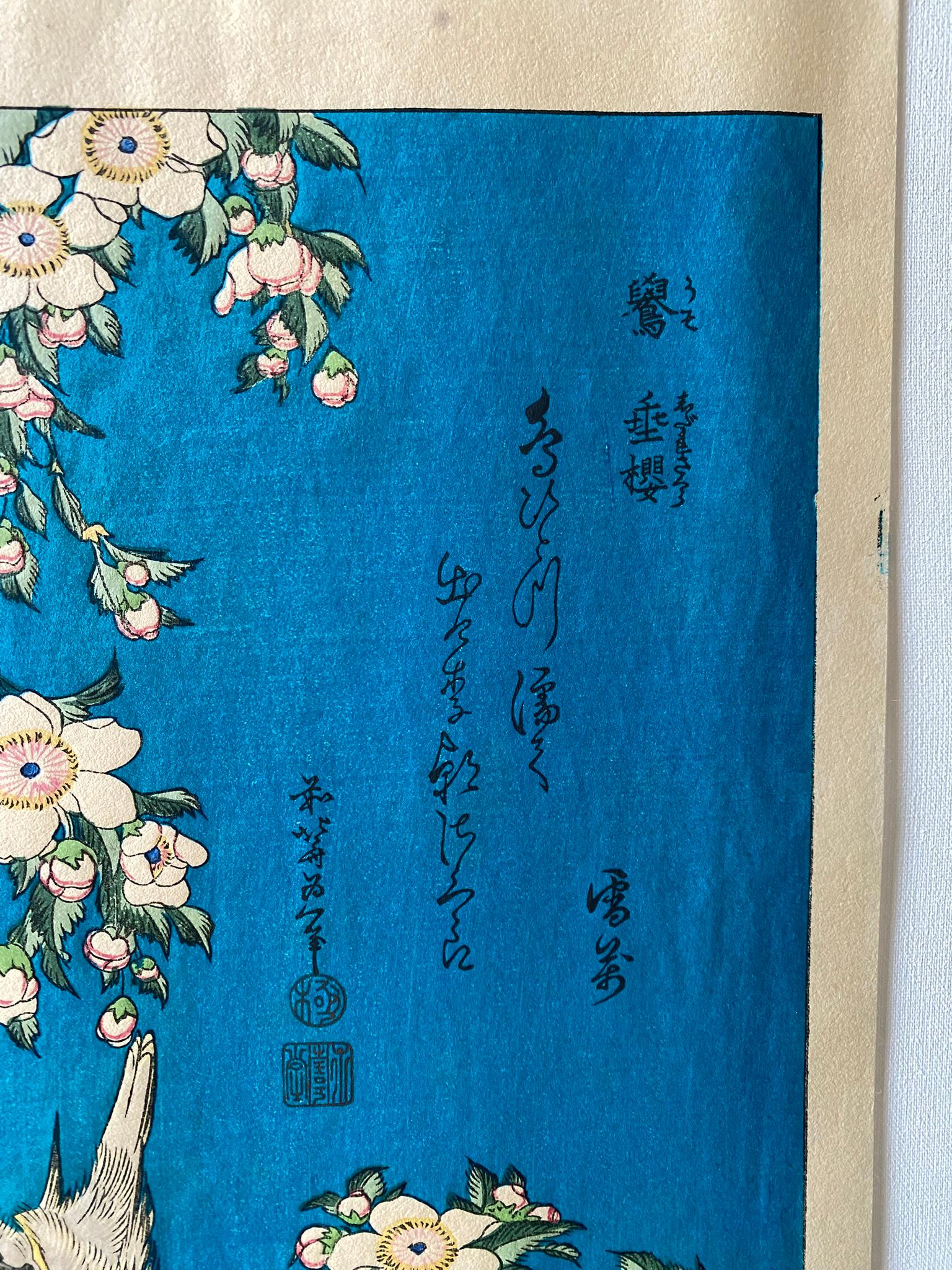 This authentic woodblock print is titled, Uso shidare-zakura 鷽 垂桜 (Bullfinch and weeping cherry-tree). It is printed and published by Ukiyoe Kenkyusho studio, known for making authentic-style reprints in 50s.

In Japanese culture, the bullfinch