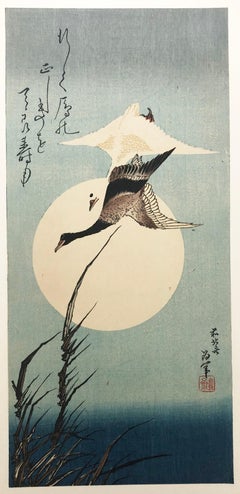 Antique Deux canards volants devant la grande pleine lune.