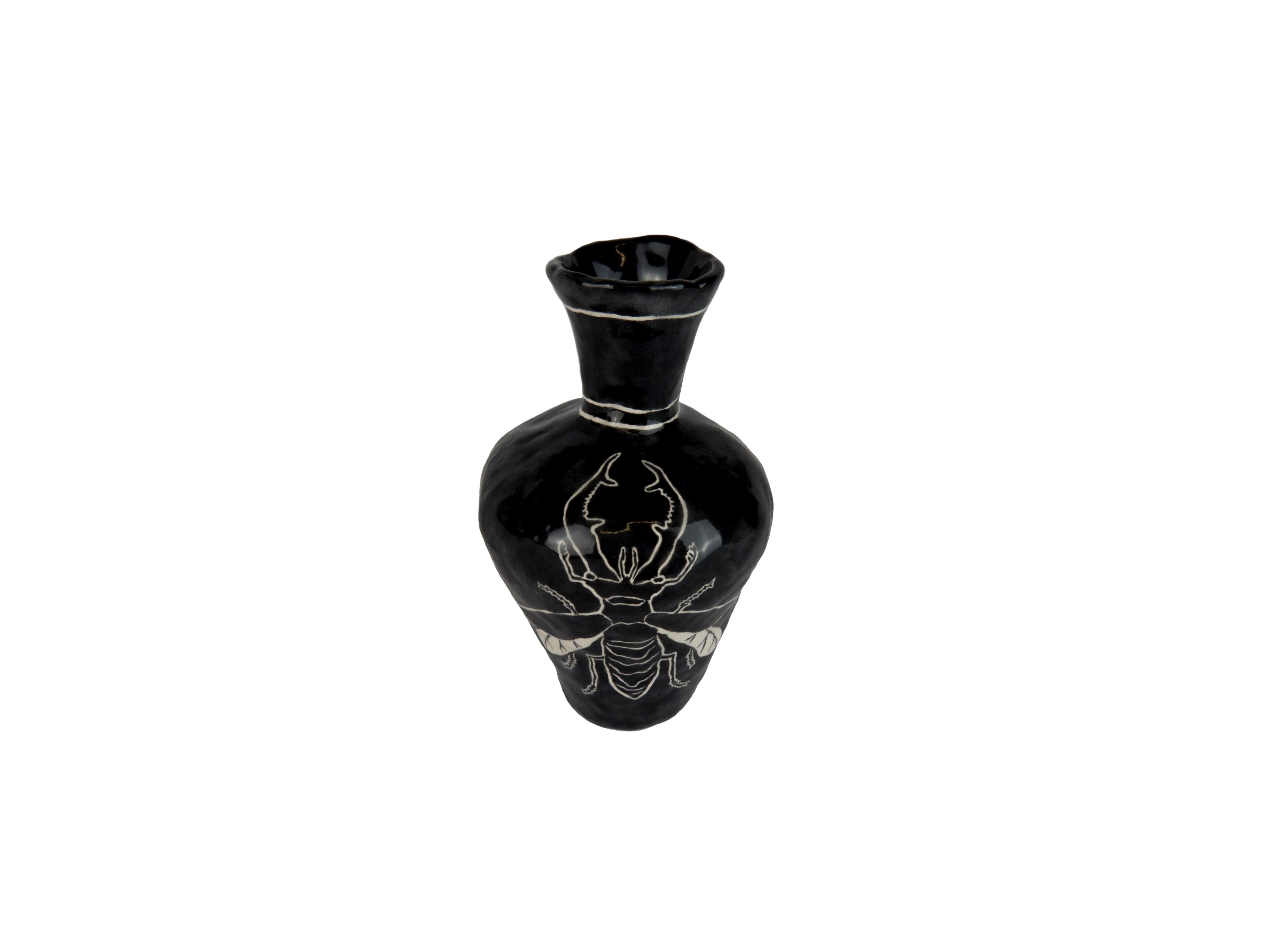 'Black Stag Bottle' by Katy Stubbs. Ceramic earthenware with underglaze.

