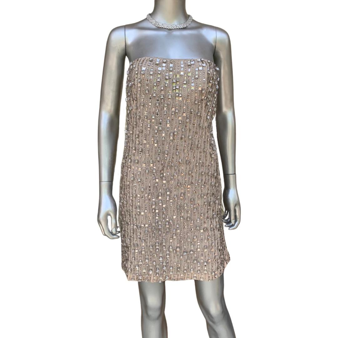 This is one of favorite 2 cocktail dresses we have ever had. designed by KaufamnFranco, this nude/tan color silk dress is entirely hand beaded in rhinestones. different shape rhinestones for interest. the dress has a built in bustier that closes