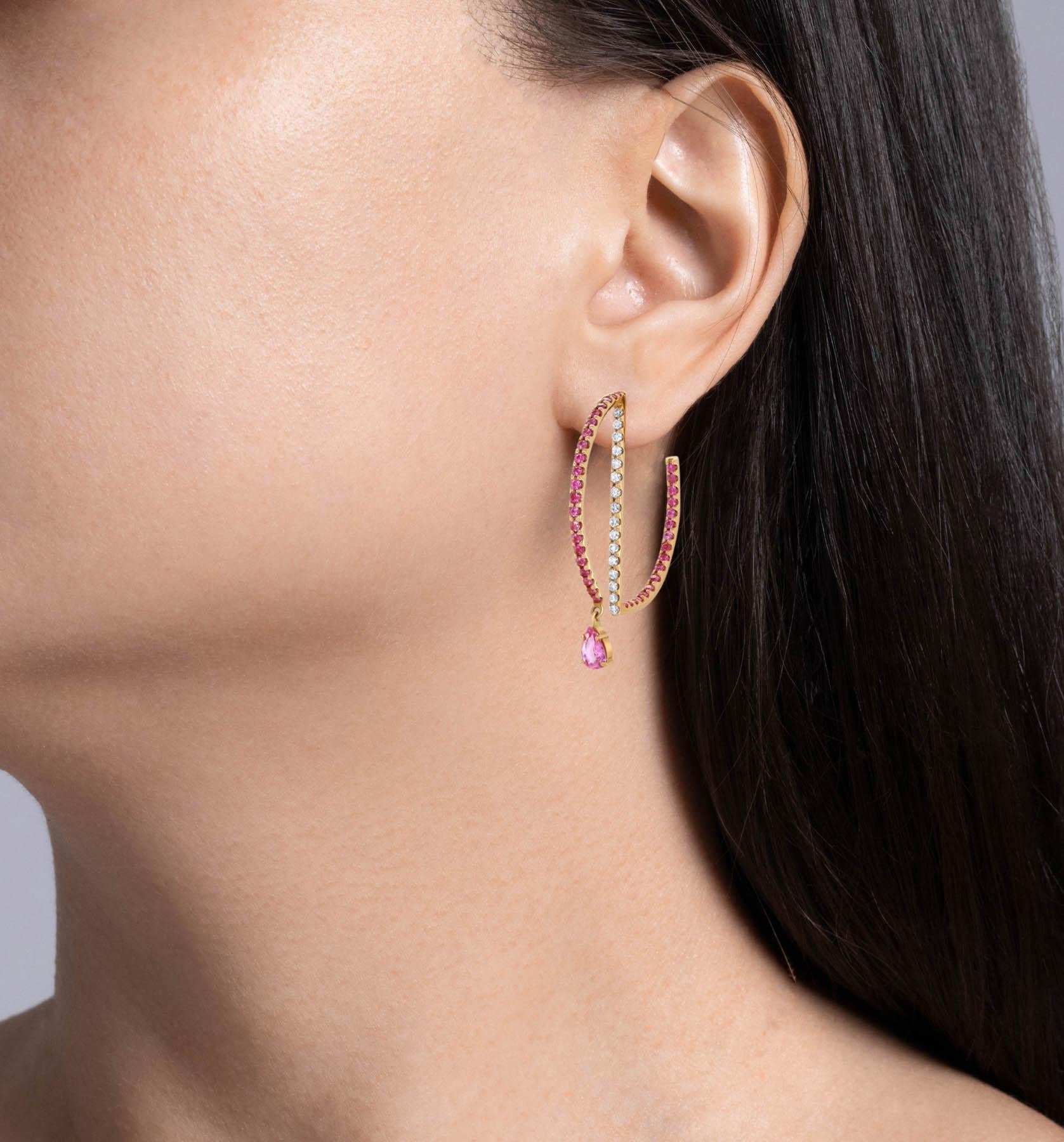 Kavant & Sharart Pink Sapphire and Diamond Geo Art Hoop earrings in 18k Rose gold 
Set with Pear and Round shaped Pink Sapphires; estimated total weight is 1.17 carats. 
There are also Round Brilliant diamonds; estimated weight is 0.52ctw.
Each hoop