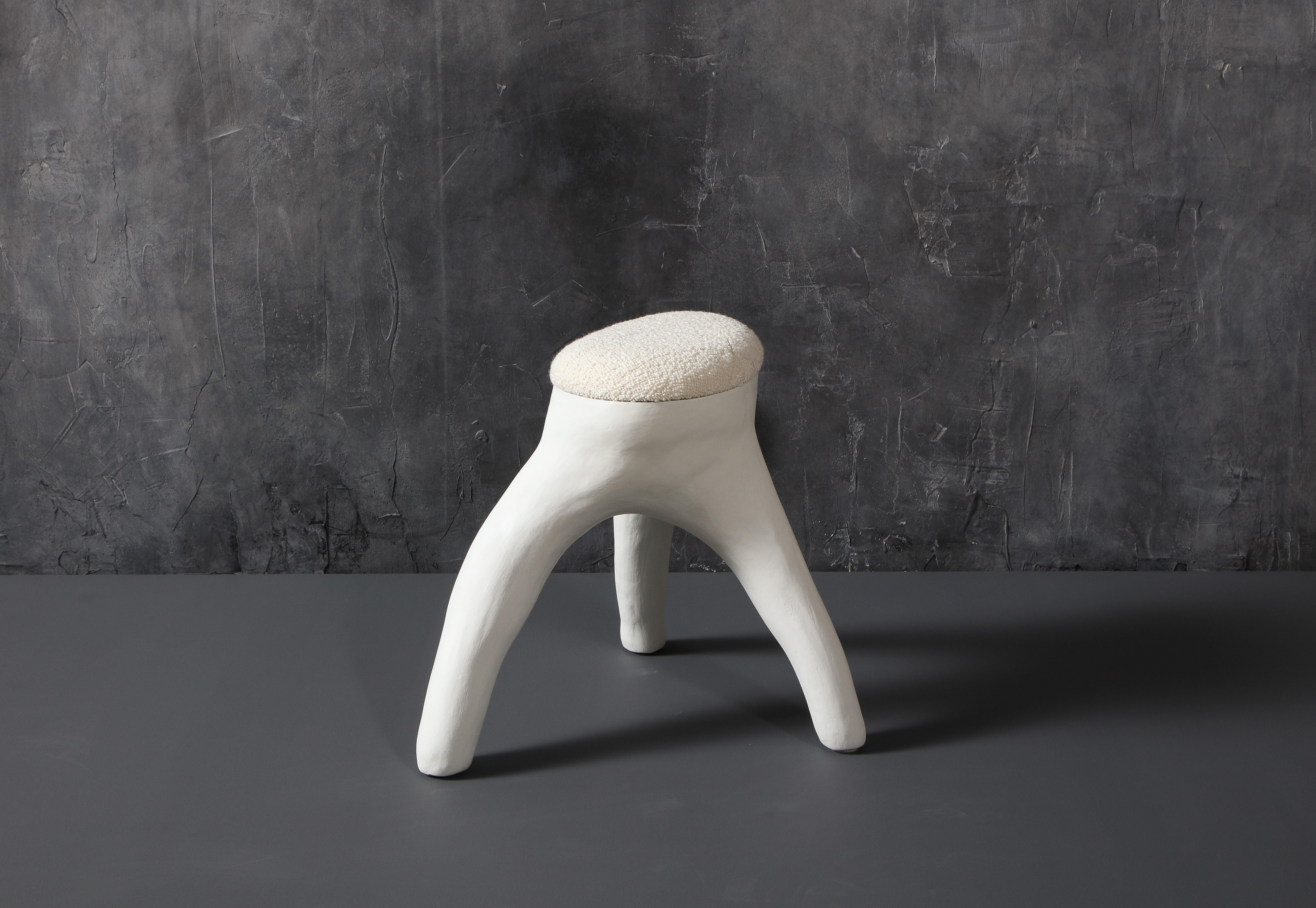 Kavrn stool, 2021.
Polished concrete, upholstery.
18 x 23 x 20 in (top 16 x 10 in).