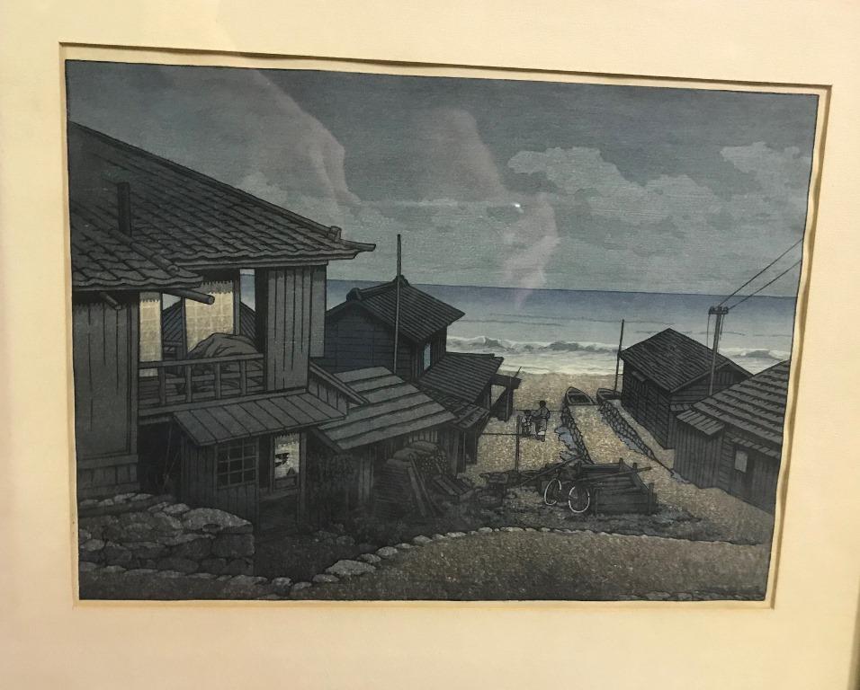 A beautiful, dark, and rich woodblock print by famed Japanese artist Kawase Hasui. This print titled 