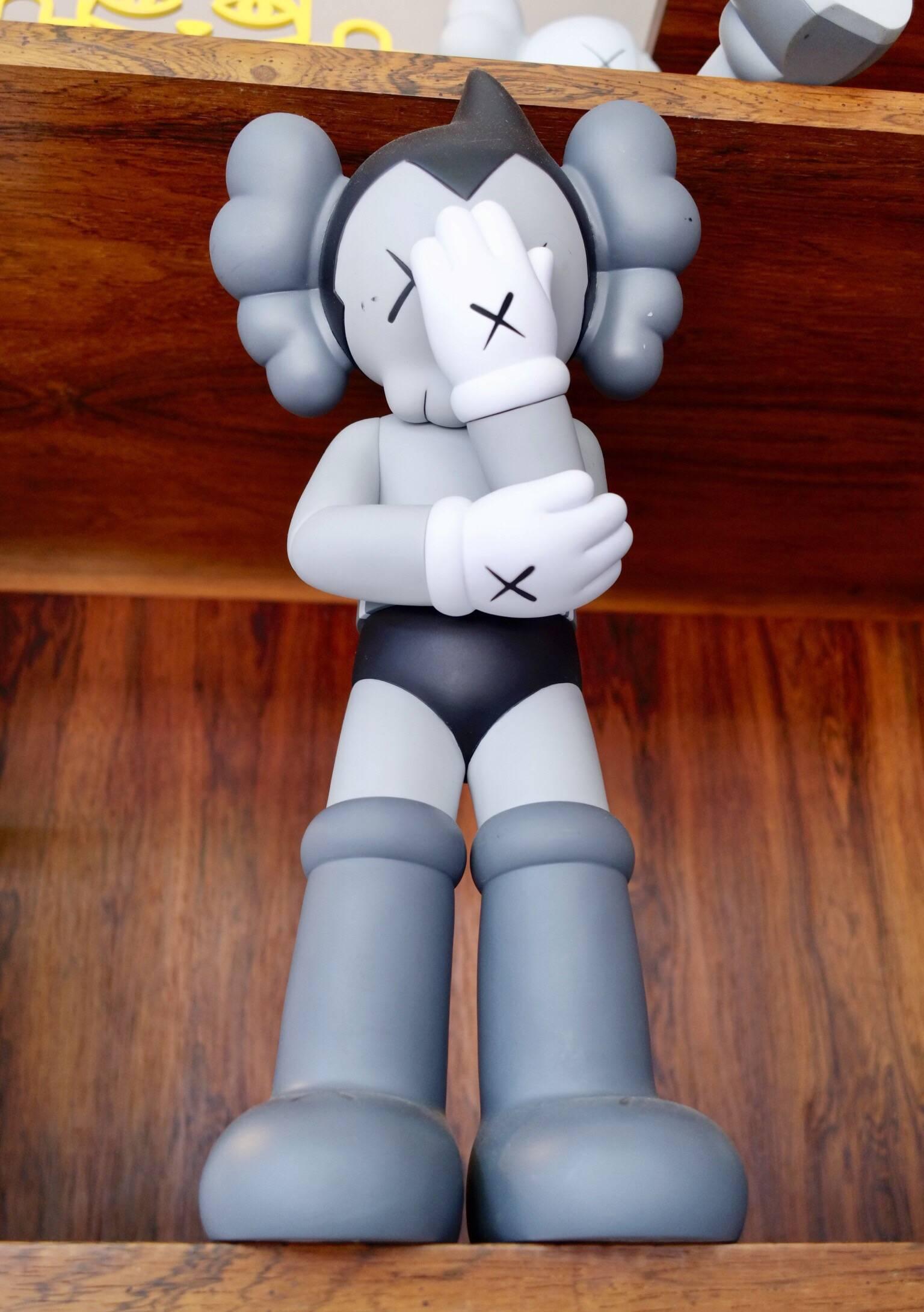 Kwas, astro boy companion, 2012.
Tezuka productions.

Black, white and two different greys.
Painted cast vinyl.
From an edition of 1000.
In its original packaging / box. 
Produced and manufactured Medicom Toy Corporation, China.

About the