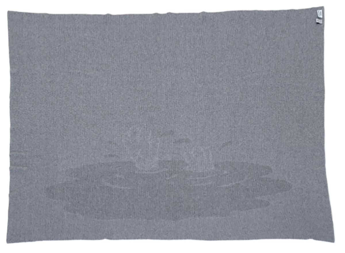 This 100% superfine cashmere blanket by KAWS by House of Voltaire. There was a limited edition of 85 made with blue water, 85 made with red water. 

Produced by master Scottish craftspeople, the double-sided jacquard technique achieves a