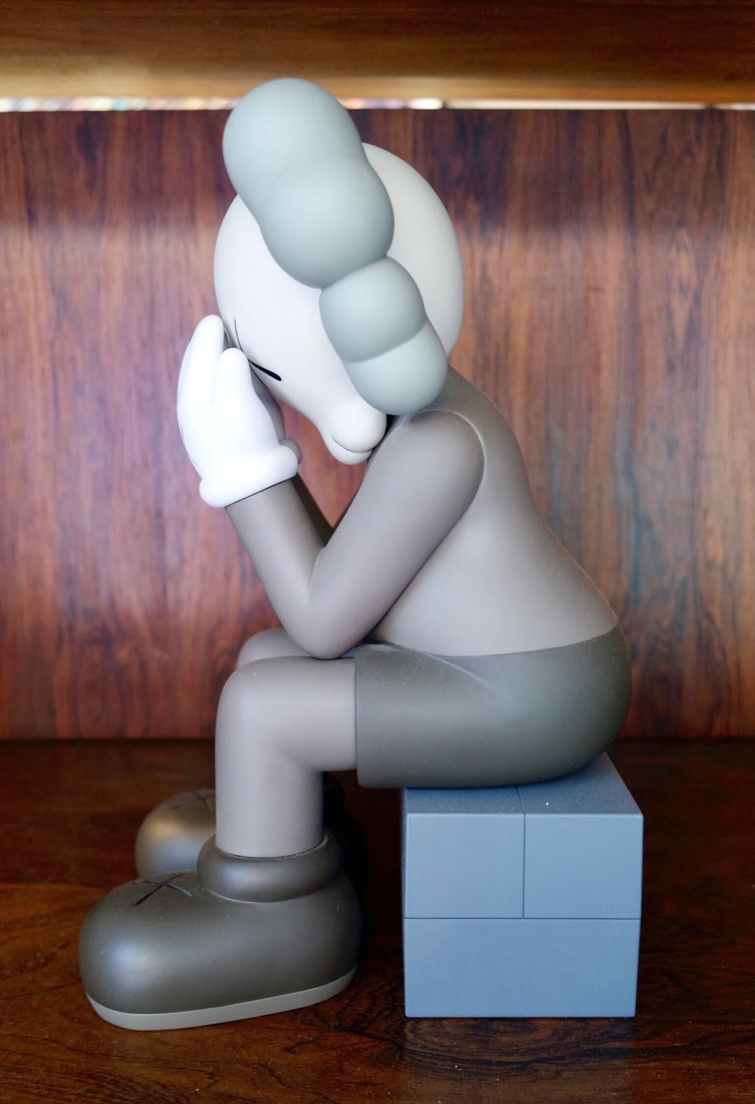 Kaws, Passing Through Companion, 2013.
Brown/bronze.
Painted cast vinyl.
In its original packaging / box.
Produced and manufactured Medicom Toy, China.