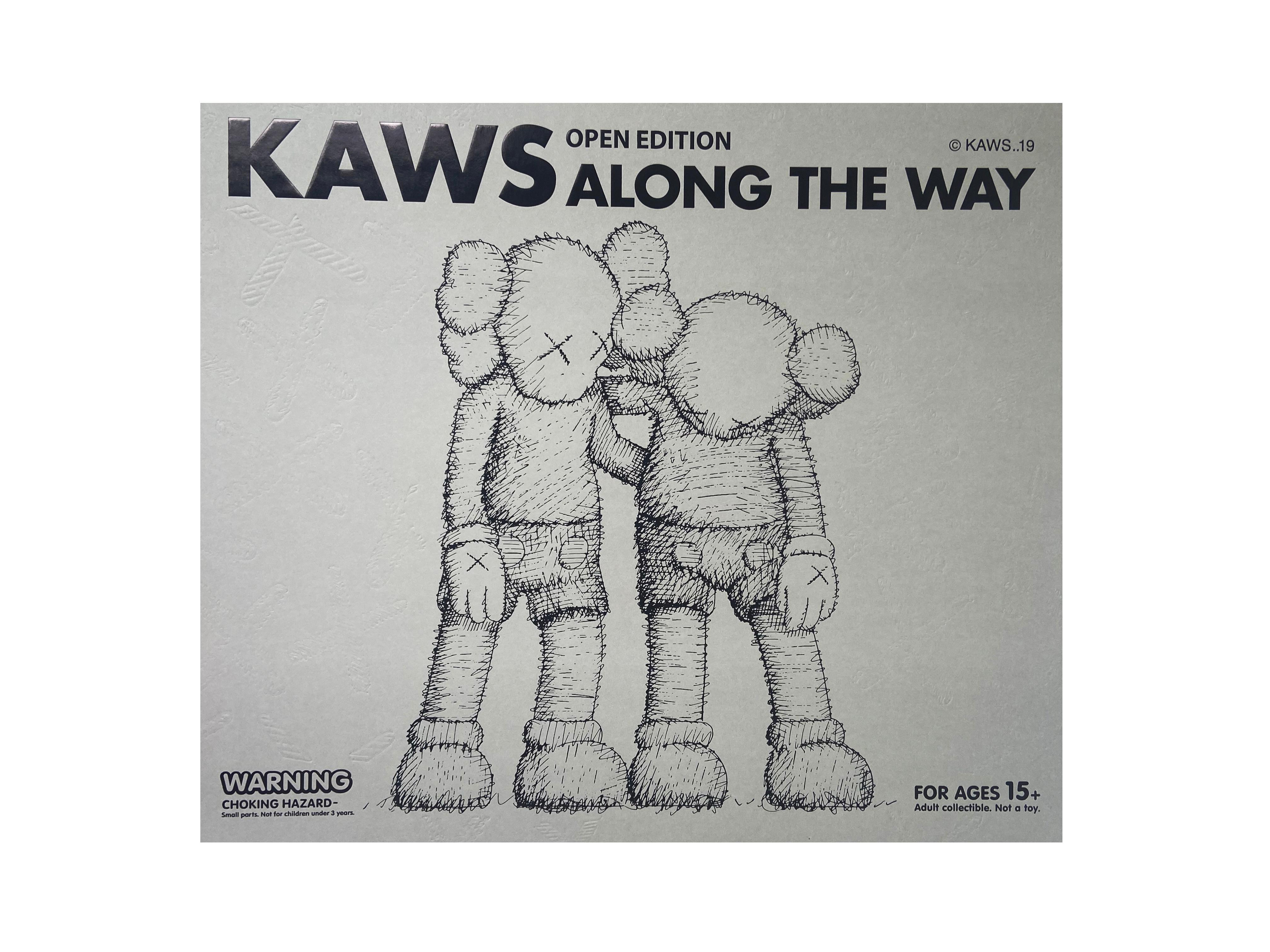 KAWS Along The Way (Grey). New and unopened in its original box:

This scarce, highly collectible KAWS Along The Way figure is a rendition of the artist's 2013 18 foot wood sculpture originally exhibited at Mary Boone gallery New York. The KAWS